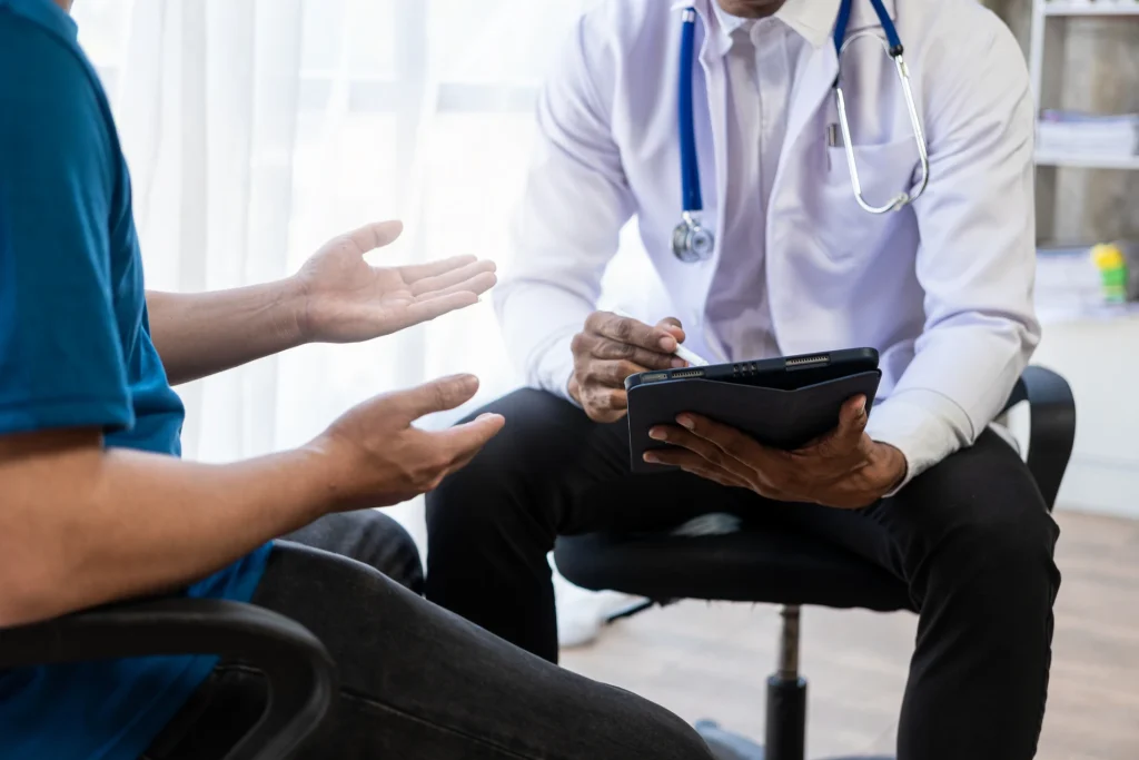 Doctor meeting patient to discuss their vasectomy procedure